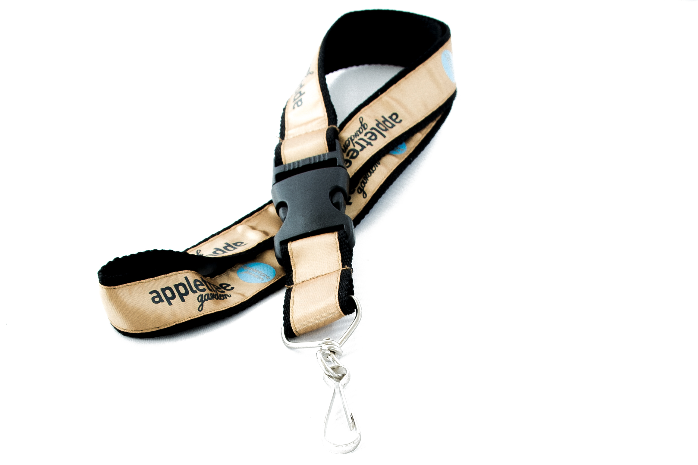 Bedrucktes, beiges Schlüsselband mit apple tree garden Logo und Metallhaken
