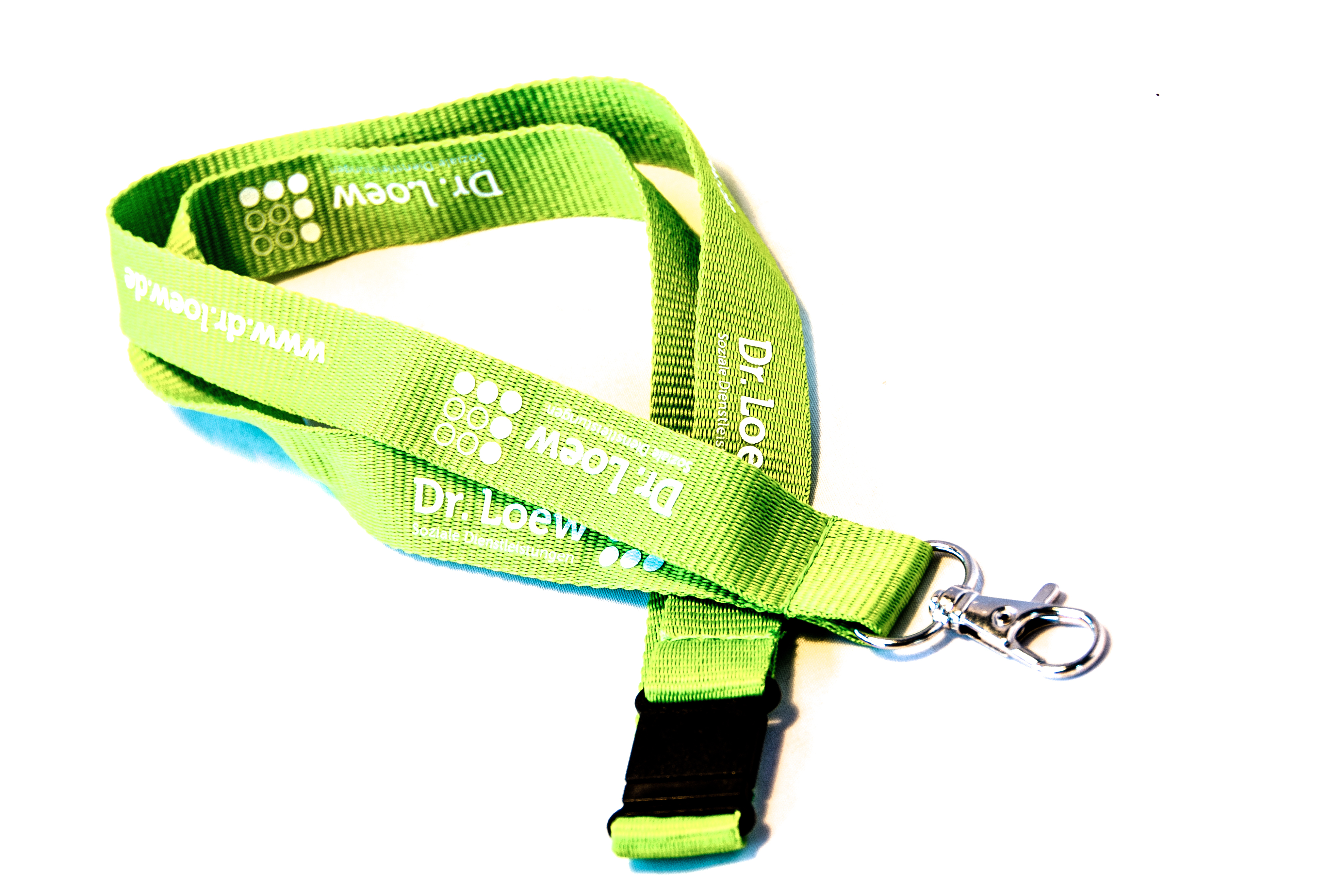 Grünes Schlüsselband mit Karabiner und Plastik-Clip